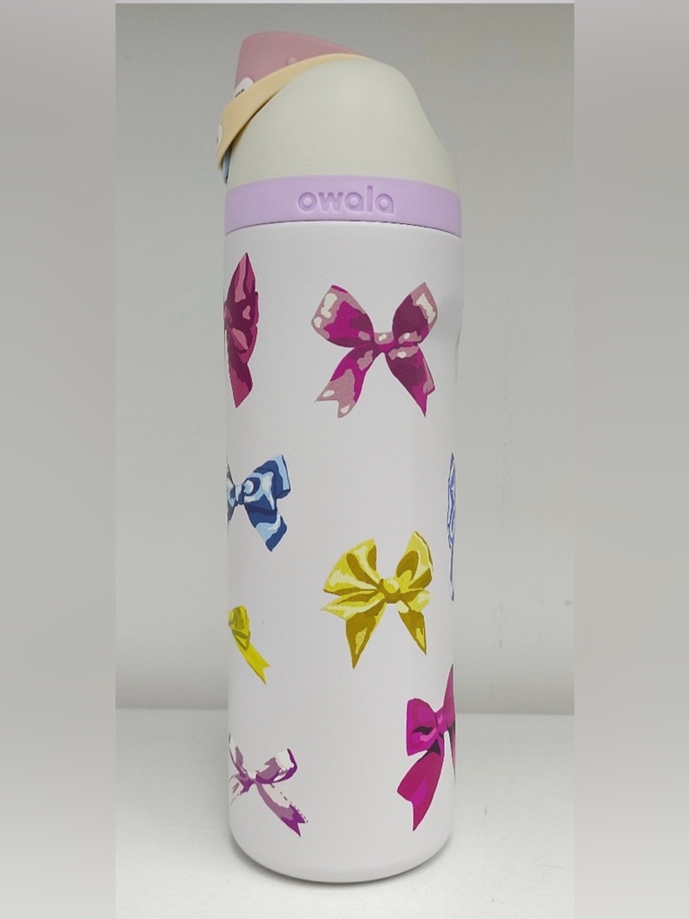 24 oz ,Owala White Bottle with Pastel Bow Print